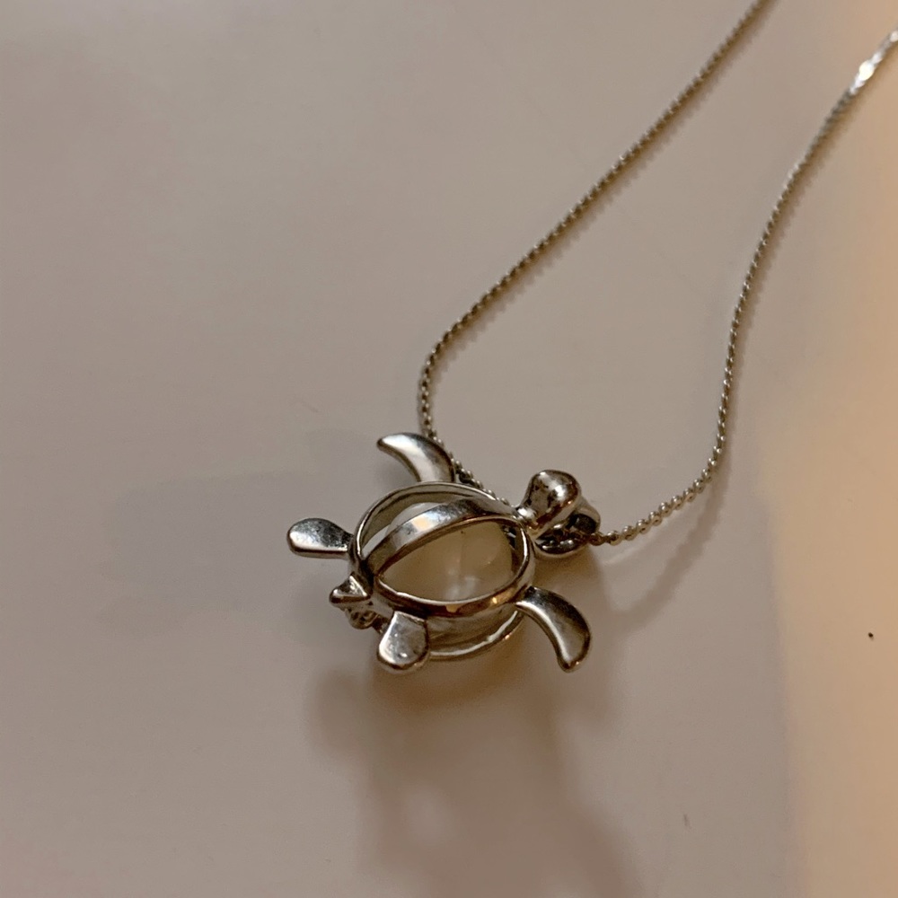 Sea Turtle Cage and Pearl necklace